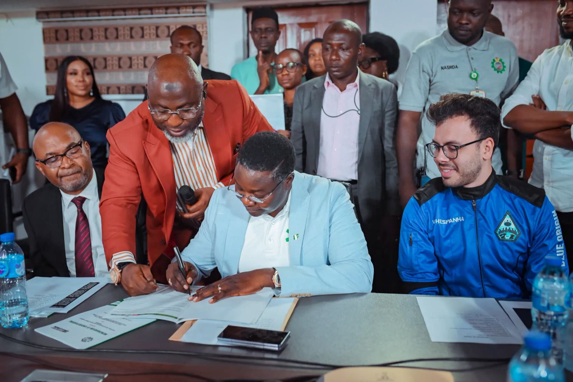 Dr.Matthew Adepoju, Director General of NASRDA, signs the agreement