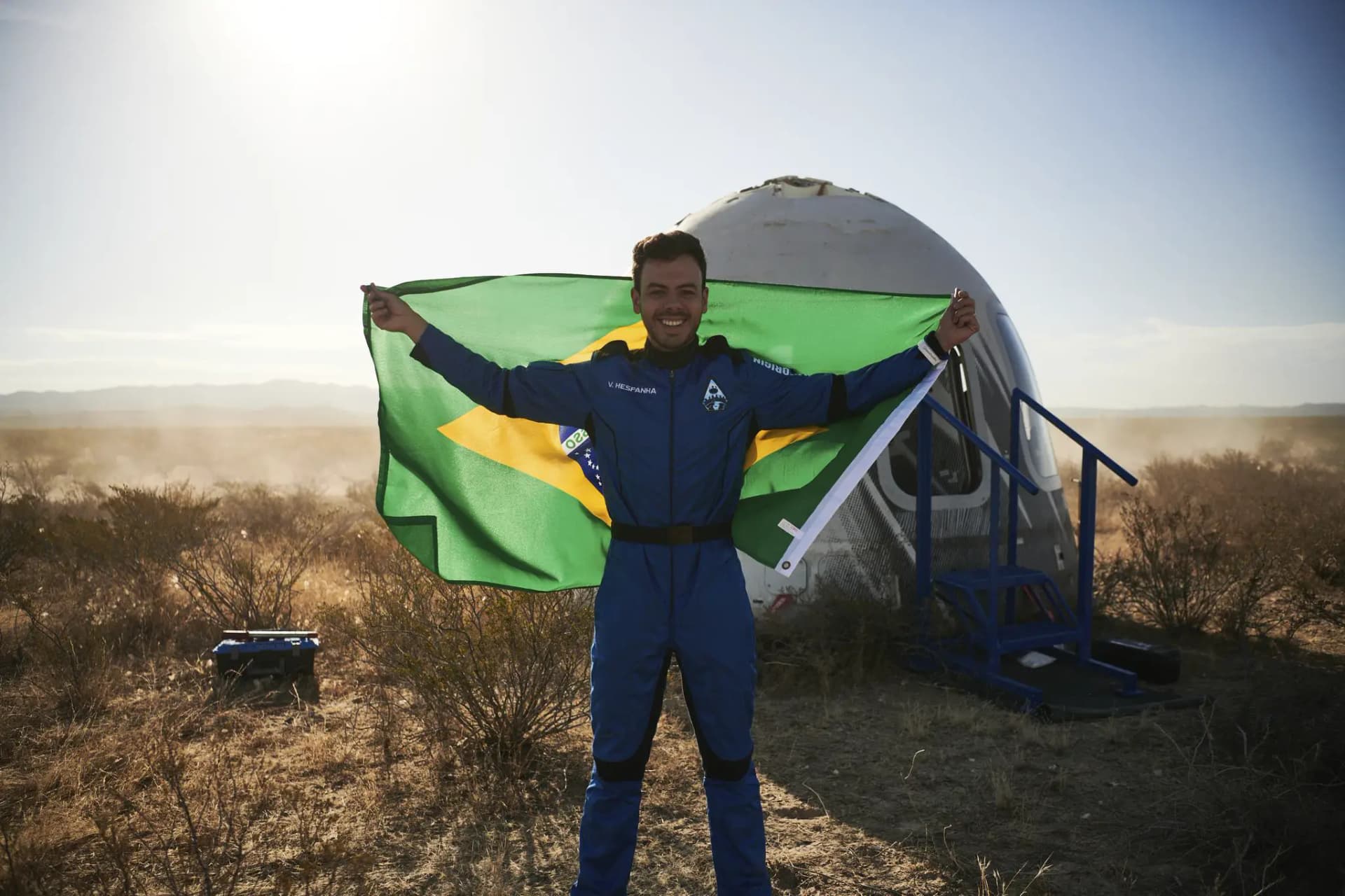Victor Hespanha holding a Brazilian flag